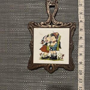 Vintage iron ceramic trivet